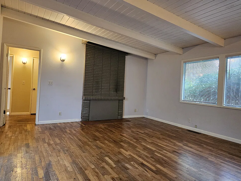 Living room with vaulted ceiling
