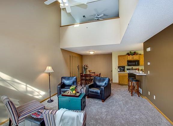 Open floor plan with living room, dining room and kitchen all open to each other.