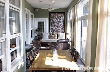 Enclosed Lanai
						:
						Wall to wall windows, tile floor, three ceiling fans