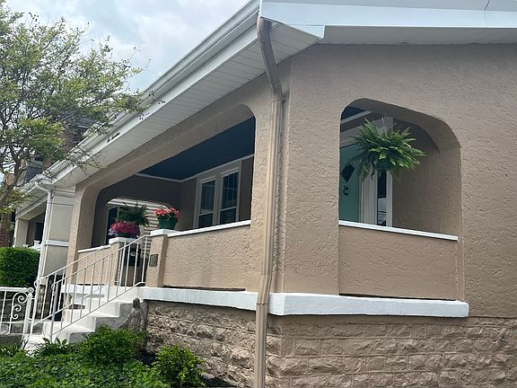 Covered front porch for chatting with neighbors.