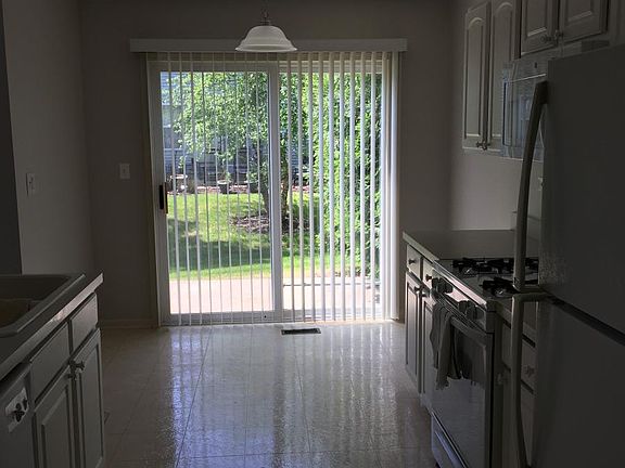 Kitchen looking out through breakfast area