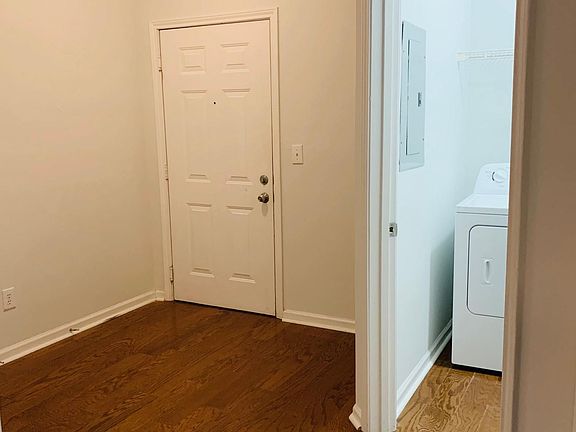 Open Floor plan with lots of light and hardwood flooring in living areas. Laundry room washer and dryer.