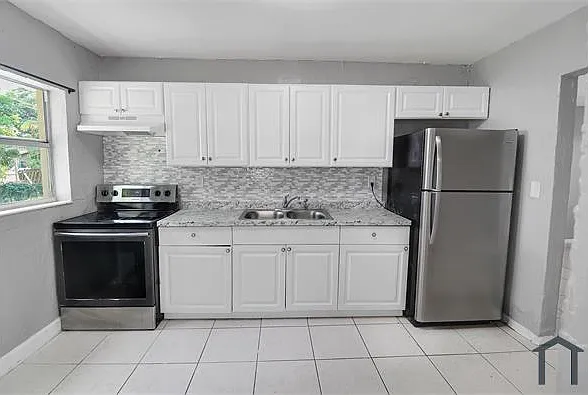 3020 NW 7th St — Photo 1