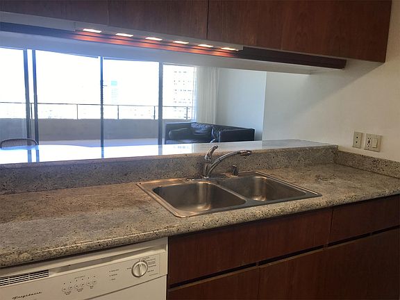 Pass through kitchen open to living room and dining area