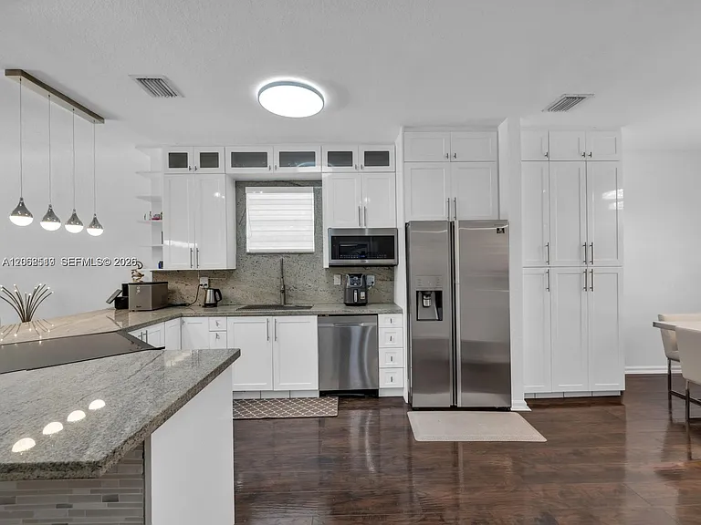 8956 SW 215th Ln — Photo 42