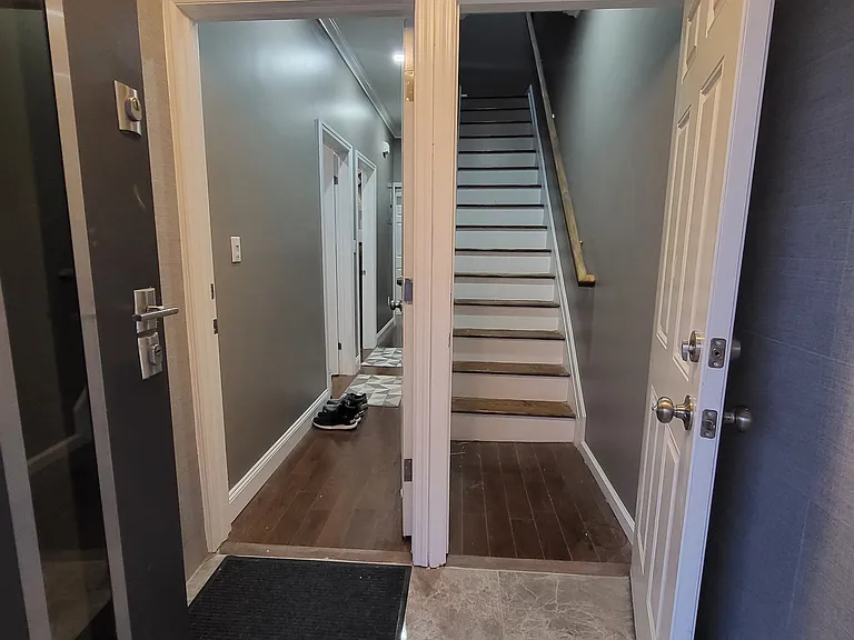 Foyer and Entrance to 2nd Floor Apartment on right