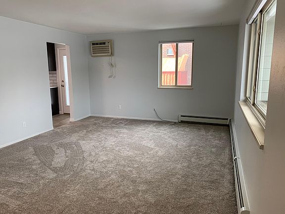 Living room with AC unit