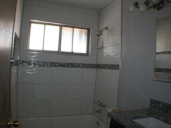 Updated tiled shower area, new bathtub