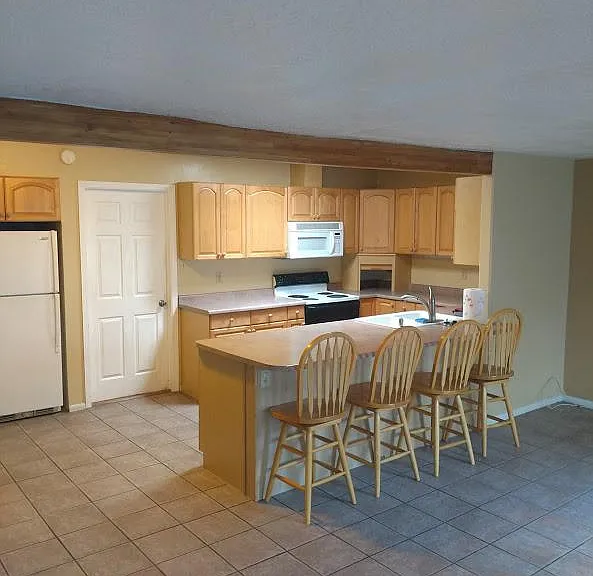 Kitchen view from dining room/den