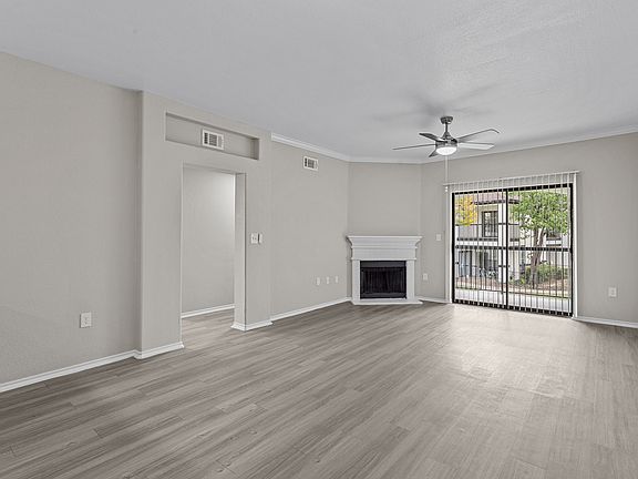 Open Living Floorplan with Wood-Inspired Plank Flooring