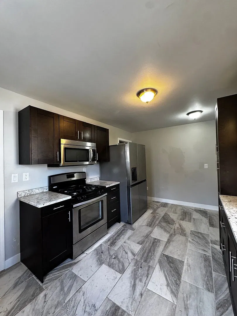 Available NW, Classic Charm, Updated Kitchen & a Fenced Backyard and 1-Car Attached Garage — Photo 1