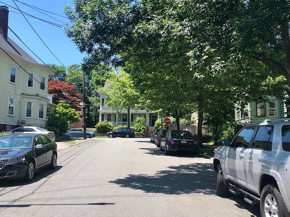 quiet tree lined street with ample parking