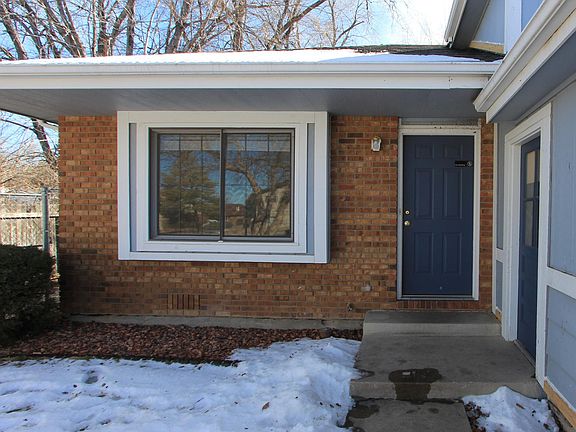 Front door, garage door to the right