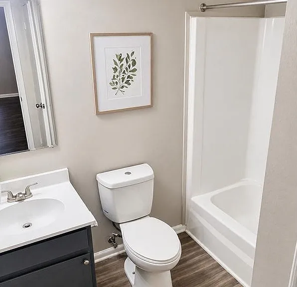Enhance your lifestyle at Richmond Hills Apartments, where modern design meets comfort. This stylish bathroom features sleek finishes and ample space for relaxation. Take the next step toward your dream home today!