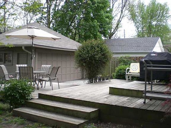 Back yard w/ 2 car garage and multi-level deck