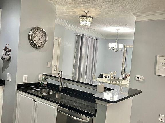 View of dining room from kitchen