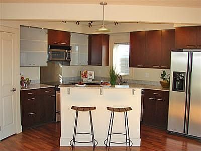 Beautiful kitchen with stainless steel appliances and granite counters