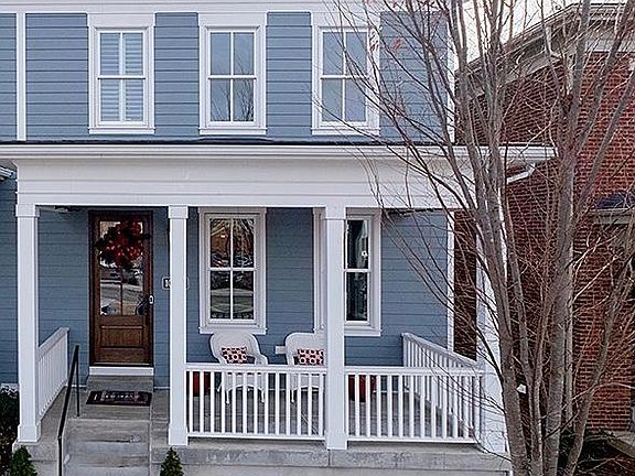 Front view of home with a large welcoming porch
