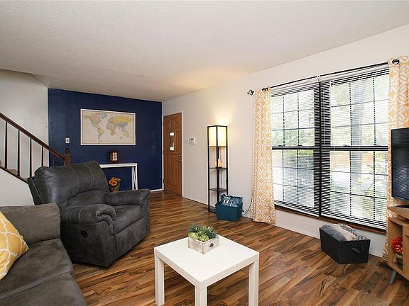 Spacious living room with newer flooring