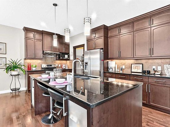 5th image of 63 NE Silverado Ridge Cres SW