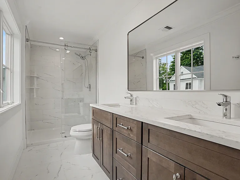 A Spa_Inspired Luxury Bath with Refined, Modern Finishes