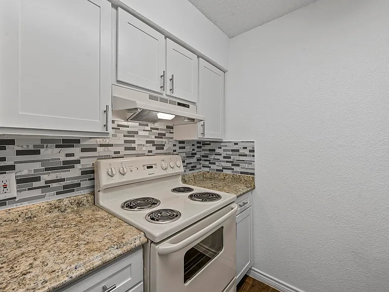 Updated kitchen with beautiful countertops