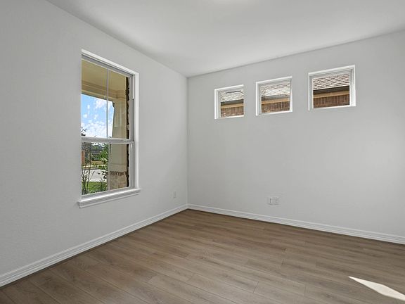 The study is a quiet retreat perfect for working from home or managing household tasks.