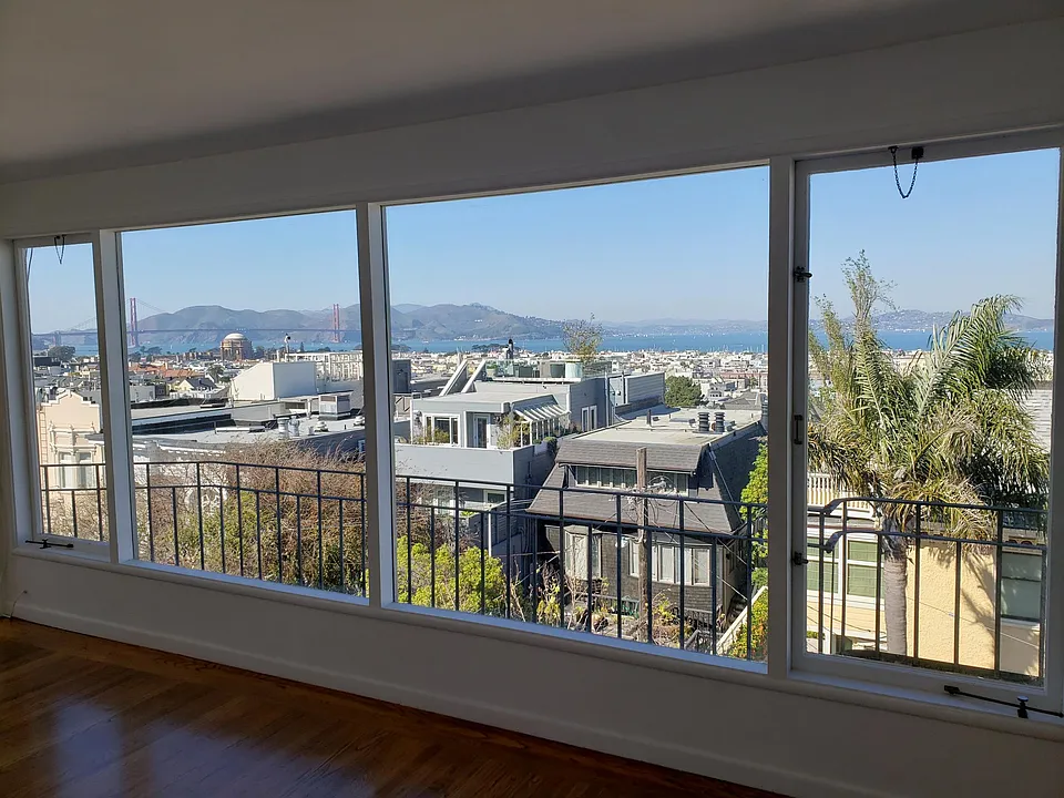 Close-up view from the living room facing west. The Gold Gate Bridge and Palace of Fine Arts in the background.