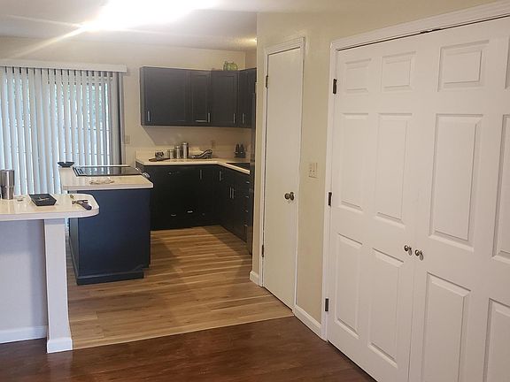 dining room and kitchen with laundry room