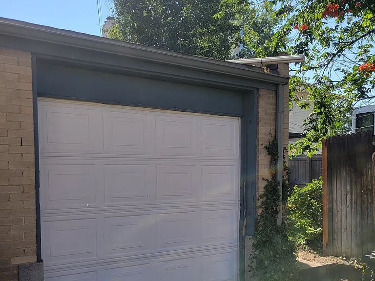 Detached 1 car garage with automatic door opener.