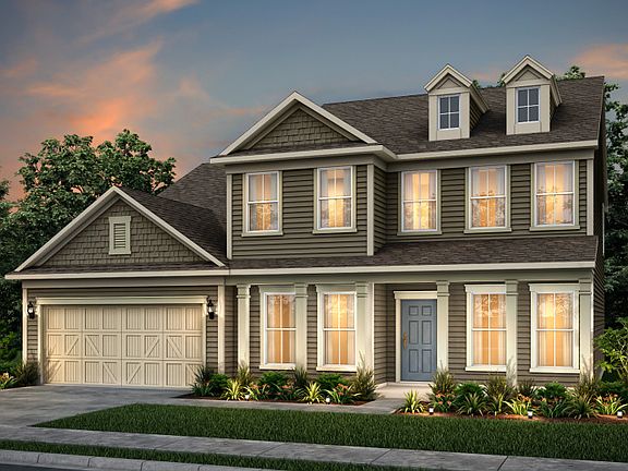 Riverton exterior 54 features siding, shakes, covered front porch and 2 car garage