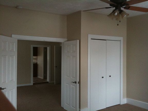 Bedroom looking at kitchen