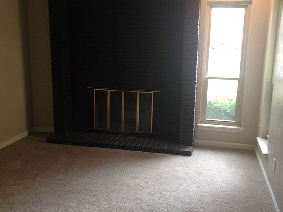 Living Room with Cozy woodburning fireplace