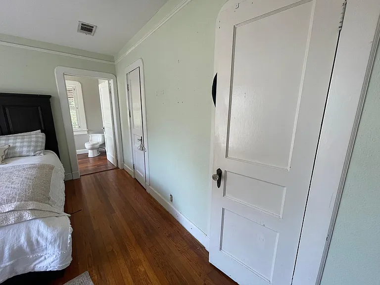 Master bedroom closets line the entire wall.