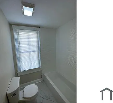 107 E 9th St — Photo 11