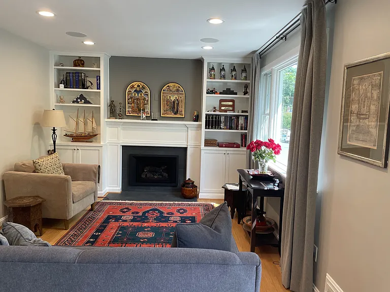 Custom-build cabinets and fireplace surround. Gas fireplace with remote control.