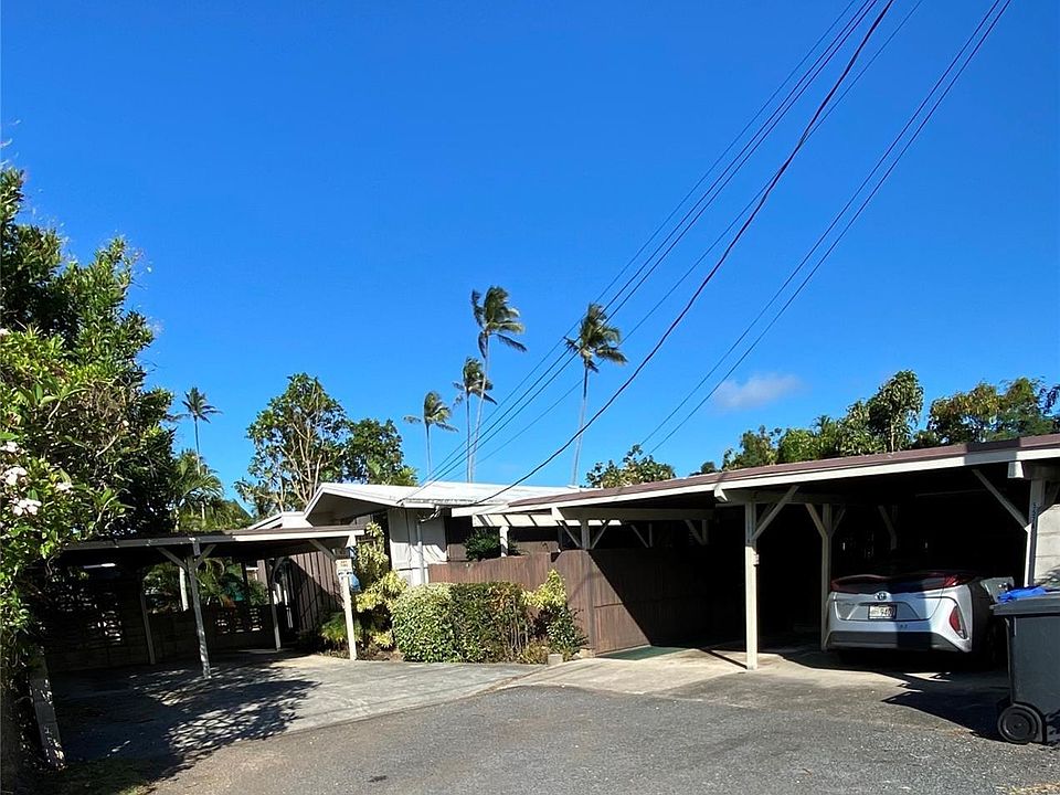 Carport on the right for house. Shared driveway.