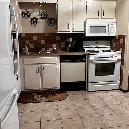 3rd image of 9024 Portage Pointe Dr APT C