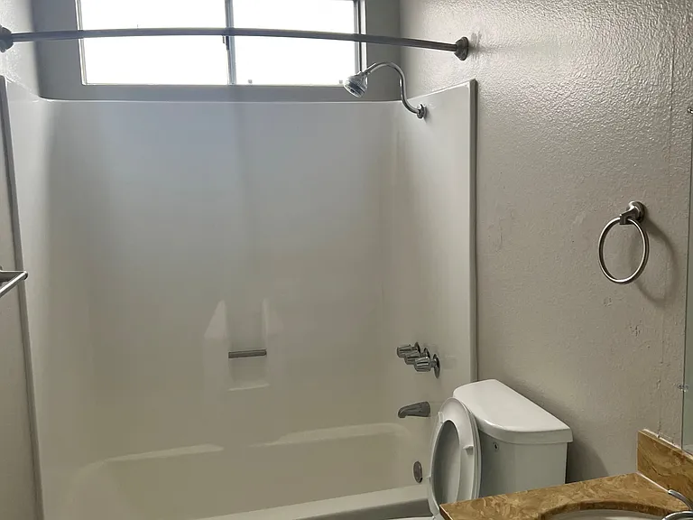 Bathroom with natural lighting at IKARIA Apartments in Santee, California.