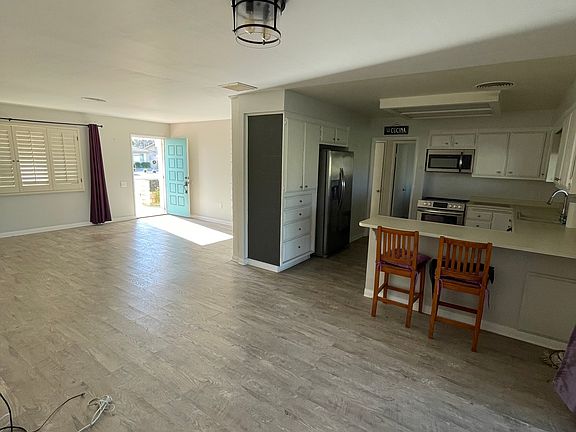 Open Layout with Liviing/Dining and Kitchen and access to yard