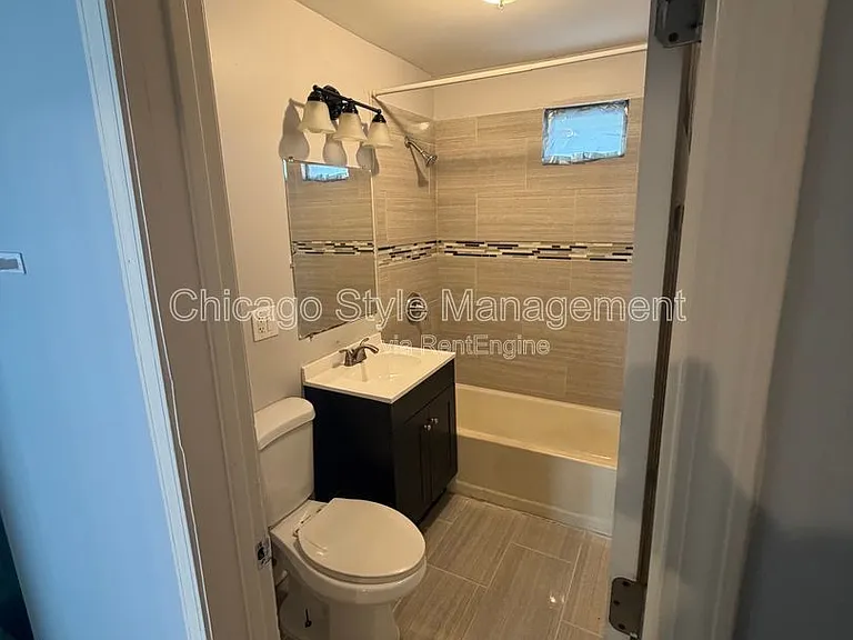 8756 S Exchange Ave #1F — Photo 4