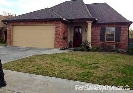 Front Yard View from Street
						:
						Stucco porch with nice gas lamp. Huge garage with step up for freezers & fridge