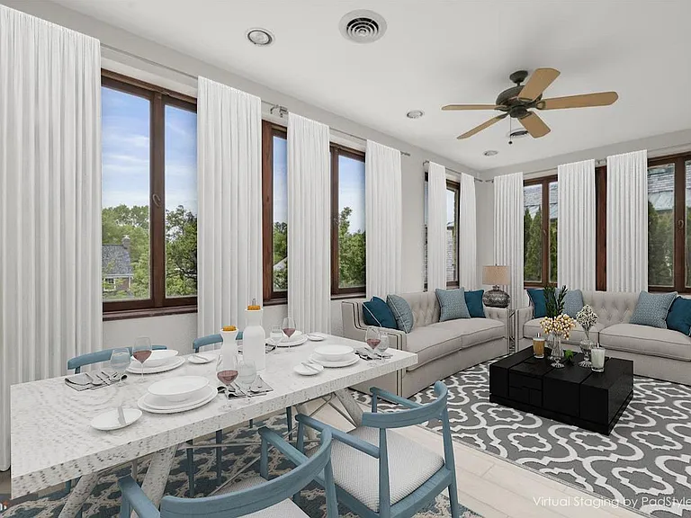 Entry-level family room also serves as a breakfast dining. Pella wood casement windows provide West and North views overlooking the rear yard. A separate door provides direct access to the garage and patio.