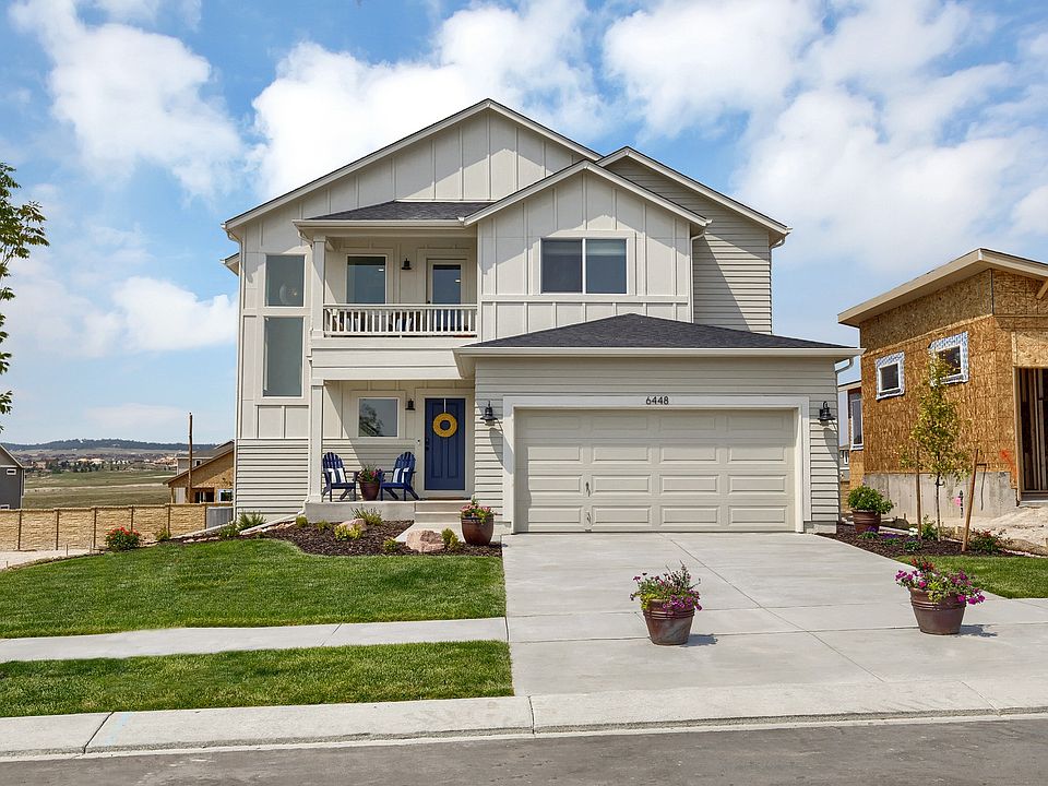 Farmhouse Exterior Photo representing home to be built and may demonstrate optional features