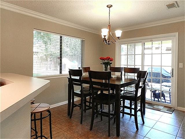 Dining room has access to covered patio.