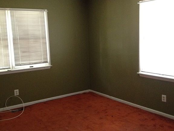 Downstairs bedroom with walk in closet