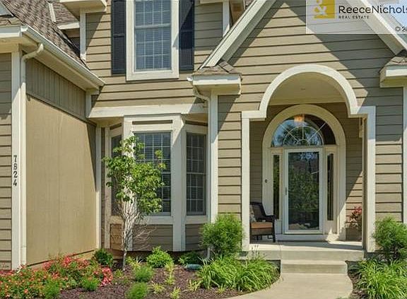 New landscaping surrounding home.