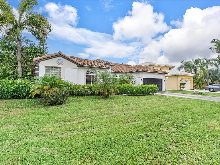 9251 NW 42nd Ct — Photo 46