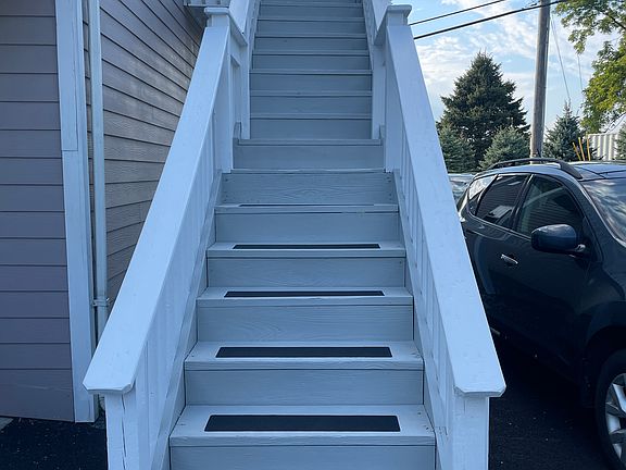 Let's start at the beginning, with your private staircase, newly painted and featuring safety treads.