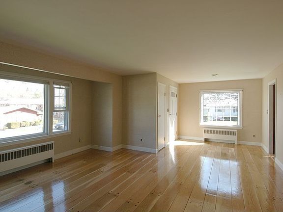 living room: bay window is recessed into an alcove